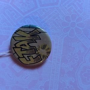 Sound effect pin made from vintage comic